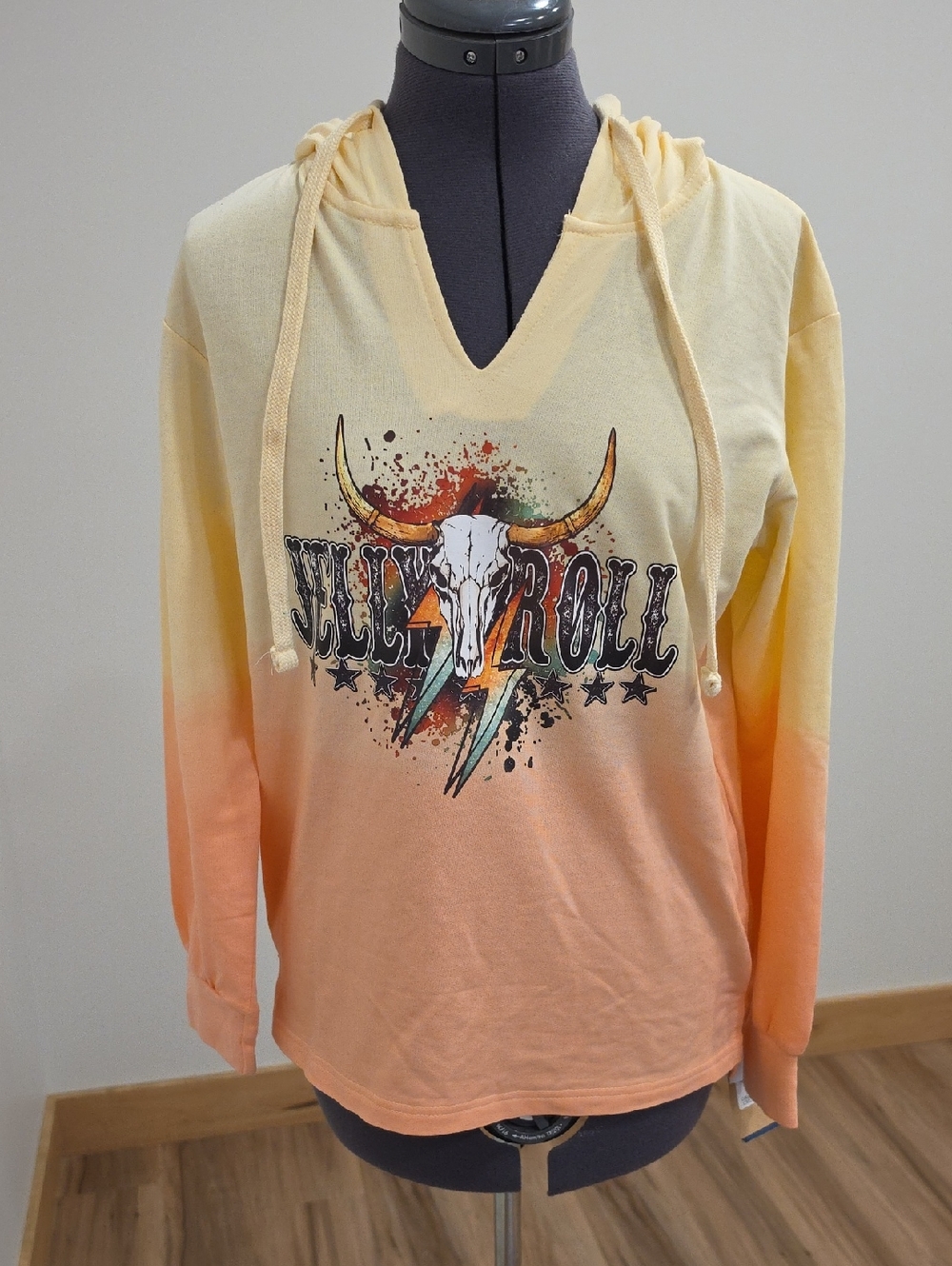 MV Sport Yellow-to-Orange Hooded Sweatshirt with Jelly Roll And Skull Graphic